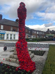poppy display on war memorial