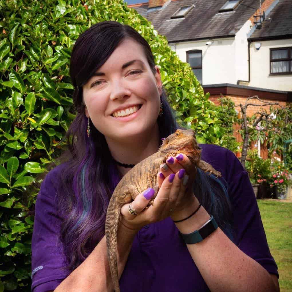 woman holding an animal