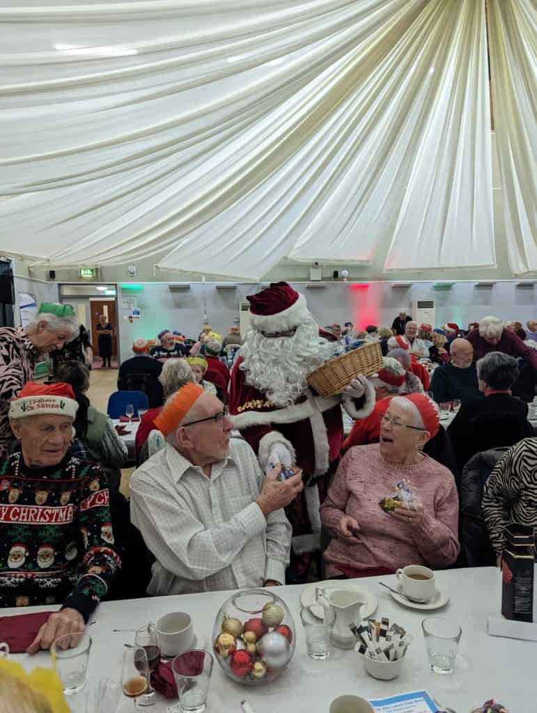 FATHER CHRISTMAS WITH GUESTS