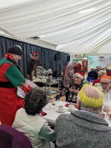 photo of christmas elf at over 60s lunch
