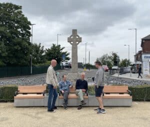 councillors sitting on new benches on Flitwick Town Square