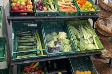 Flitwick Community Fridge - Fruit & Veg Display A set of shelves containing fruit and veg