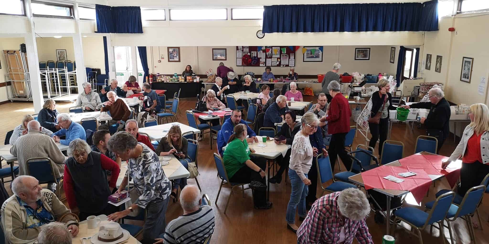 group of people sitting in room