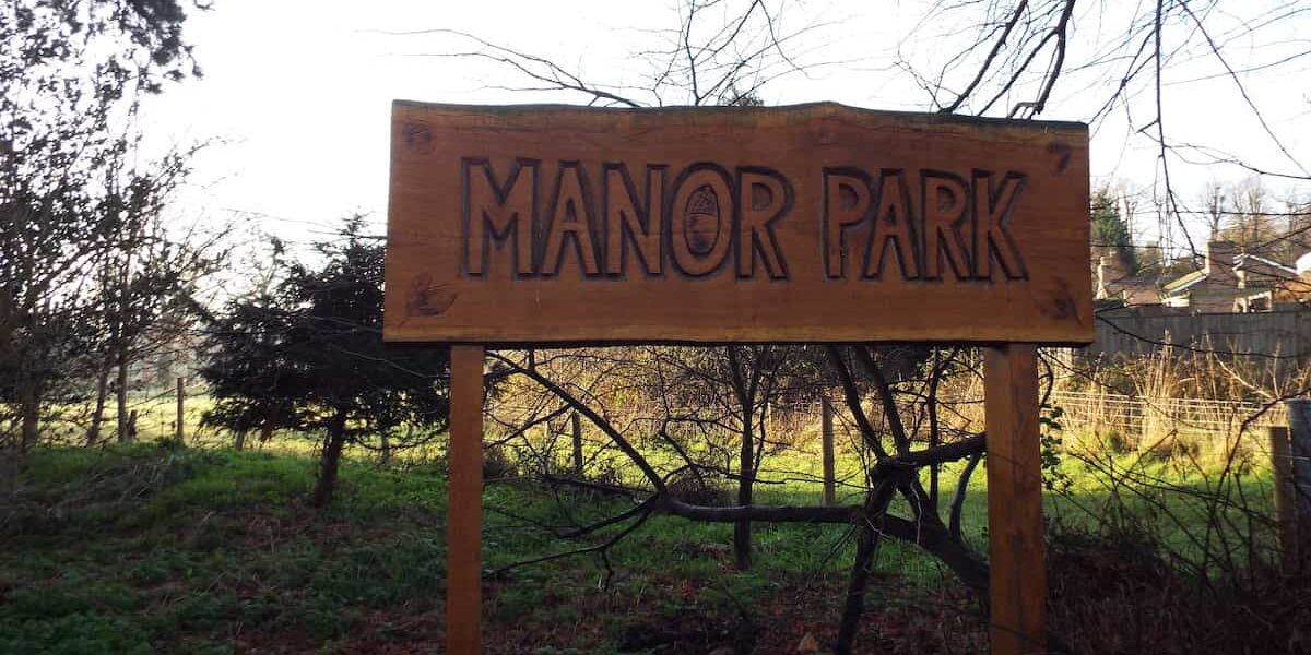 WOODEN MANOR PARK SIGN